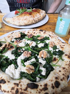 Pizza bianca and a calzone at La Stella Nera in Berlin