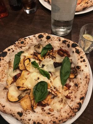 Pizza with vegan cheese and spicy tofu  at La Stella Nera in Berlin