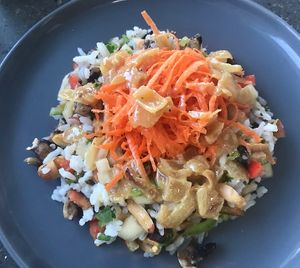 Rice salad with shredded carrot at Joe's Place in Pico