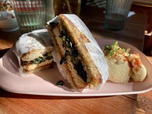 Katsu burger with potato salad - unique and tasty!  at Obon Shokudo in Portland