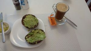 Coffee with coconut&rice milk and Avocado and lime on carrob bread. at Veganeats Caffe in Lisbon