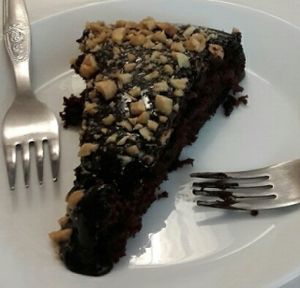 chocolate cake and rice pudding  at Veganeats Caffe in Lisbon