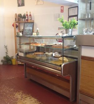 interior with some of the sweets and pastry on offer at Veganeats Caffe in Lisbon