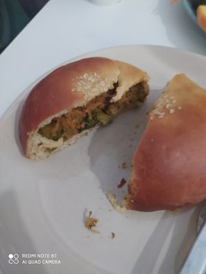 Brioche filled with vegetables at Veganeats Caffe in Lisbon