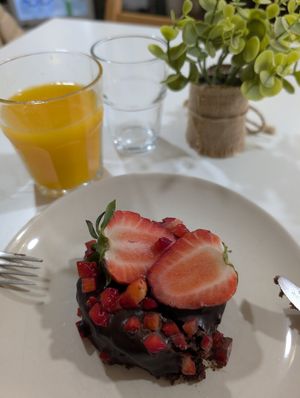 Chocolate cake with strawberries at Veganeats Caffe in Lisbon