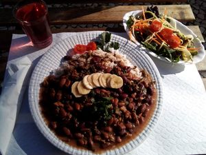 "Feijoada" (kidney beans with seitan), salad and tea at Veganeats Caffe in Lisbon