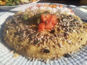 Smashed lentils with fruit, seeds and rice at Veganeats Caffe in Lisbon