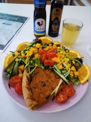 Sweet potato and rosemary pie (quiche) with salad and tea at Veganeats Caffe in Lisbon