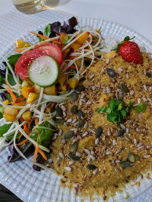 lentil puree with rice and salad at Veganeats Caffe in Lisbon