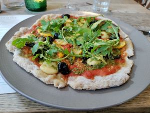 Delicious pizza with celeriac puree at Farmacy in West London