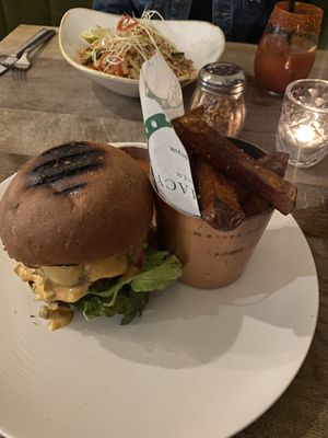 Can see burnt bun. Bottom and top, which you could taste the burtness when biting into patty.  at Farmacy in West London