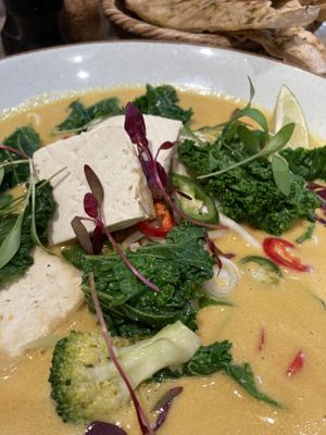 Creamy coconut curry! The tofu itself didn’t have much flavor, but the rest of the dish was so delicious that it didn’t matter to me!  at Farmacy in West London