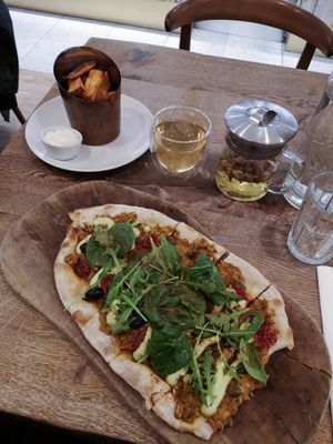 pizzeta, garlic aioli fries and rose tea🥰 at Farmacy in West London