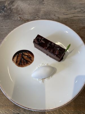 Chocolate tart with coconut ice cream  at Farmacy in West London
