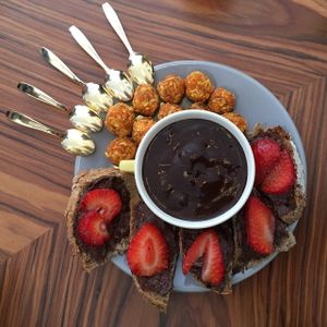 mousse chocolat banane and strawberries, along with coconut balls. :) at 1944 Gallery Vegan Shop in Paris