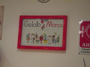 Cute mosaic with their logo. at Gelato Marco in Trieste