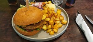 Mexican burger with nacho chips and bean patty at Funky Jungle in Mechelen