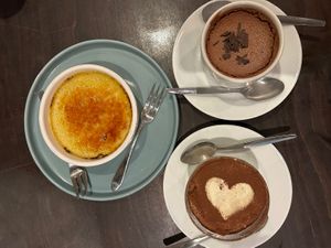 Trio of desserts: crème brûlée, chocolate mousse, tiramisu  at Funky Jungle in Mechelen