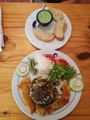 A dish called Super berenjena which seems to be their signature dish. It includes vegetable tempura, a tower of sauted vegetables with bean "sauce "  at La Berenjena in Vinales
