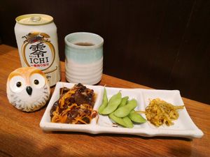 Side dishes with Tea and Non Alocholic Beer at Qiu Dou Ru La Mien - Hagi Soymilk Ramen in Kaohsiung