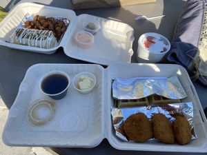 Our take out meal— the breakfast burrito and chicken and waffles. SO GOOD!!   at The Tasty in Philadelphia