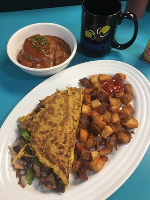 Western Omelet with home fries and a Bayou biscuit, yumm  at The Tasty in Philadelphia