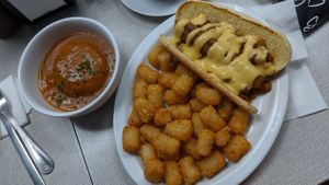 Cajun biscuits and gravy; Chili dog with Tots at The Tasty in Philadelphia