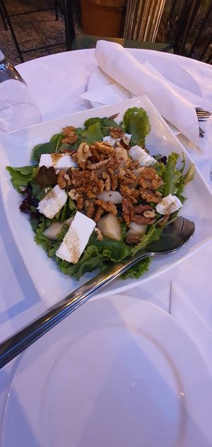 Mixed greens salad with walnuts and vegan feta cheese at The Lost Unicorn Restaurant in Tsagarada