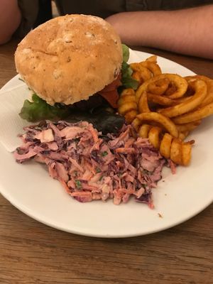 Satay burger, coleslaw and curly fries at Cafe Kino in Bristol