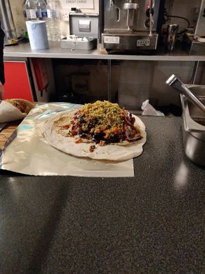 Falafel in laffa being made!! at Falafel King Food Cart in Bristol