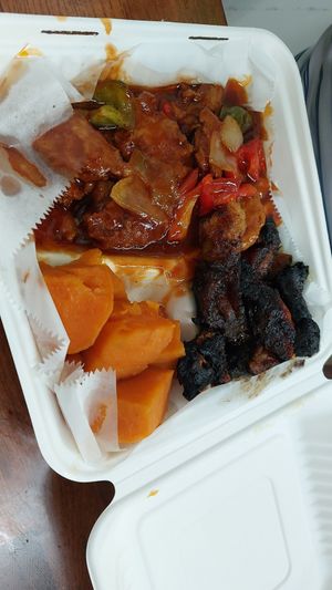 BBQ soy with candied sweet potatoes and fried plantains (they look burnt but taste great) at Jamaicaway in Nashville