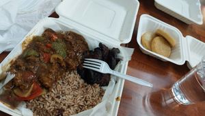 Jerk seitan with plaintains and rice and peas. We also got an extra side order of bammy or cassava cakes (on the right). at Jamaicaway in Nashville