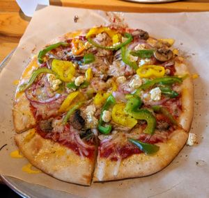 Pizza with vegan cheese and garlic butter (margarine) drizzle at Dells Pizza Lab in Wisconsin Dells