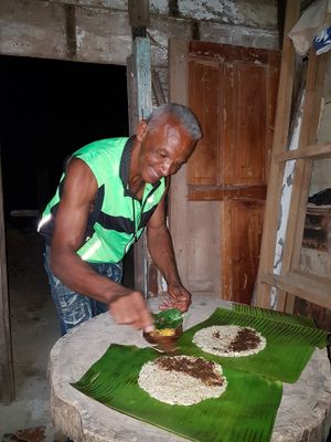 preparing food ";to go"; at Baracoando in Baracoa