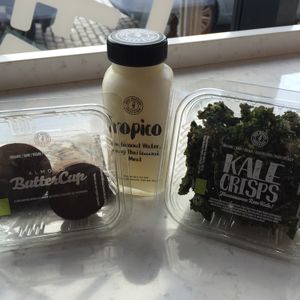 coconut drink, almond butter cups and kale crisps  at Juice Warrior in Edinburgh