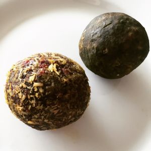 Match Boost (almond, dates, cardamon) and Powerball (cacao, goji, chilli) at The Cold Pressed Juicery - Herengracht in Amsterdam