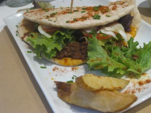 Hummus and seitan wrap at Nomit in Valencia