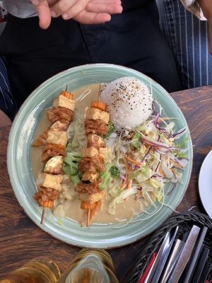 Tofu and Seitan with penutsauce and Rice  at Soya in Berlin