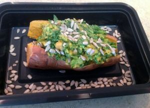 Stuffed Sweet Potato with Lentils and Mixed Greens. at Be Well Meals and Juice Bar in Myrtle Beach
