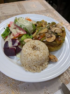 Quinoa patty, veggie salad, brown rice at La Bio Cafetta in Lima