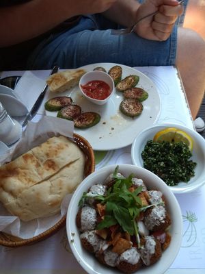 Falafel with vegetables, bread, fried zucchini at Falafel in Sarajevo