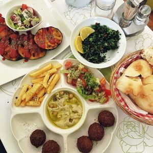 eggplant salad, taboulleh, falafel meal & pita at Falafel in Sarajevo