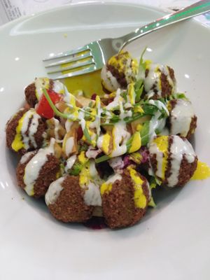 Falafel salad with tahini on top. Mmmmm yummy at Falafel in Sarajevo