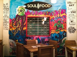 Restaurant interior with mural at Soul Food in Santa Marta