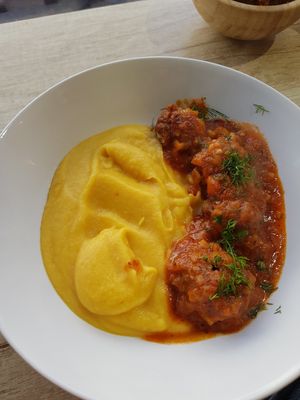 Marinated Beyond Meat meatballs with pureèd parsnips. at Vyro Raw & Vegan Bistro in Bucharest