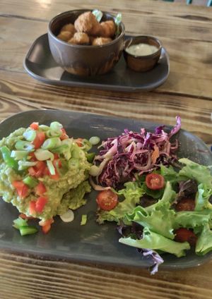 Avocado on toast and breaded garlic mushrooms at Super Natural Newcastle in Newcastle Upon Tyne