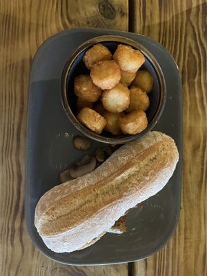 Vegan sausage, bacon and mushroom sandwich  at Super Natural Newcastle in Newcastle Upon Tyne