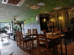 Cosy, forest canopy feel interior at Super Natural Newcastle in Newcastle Upon Tyne