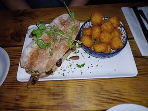 Mushroom, sausage and facon roll. Such a great breakfast sandwich. at Super Natural Newcastle in Newcastle Upon Tyne