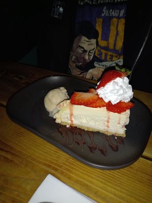 Cheezecake with Ice Cream & Strawberries. at Super Natural Newcastle in Newcastle Upon Tyne